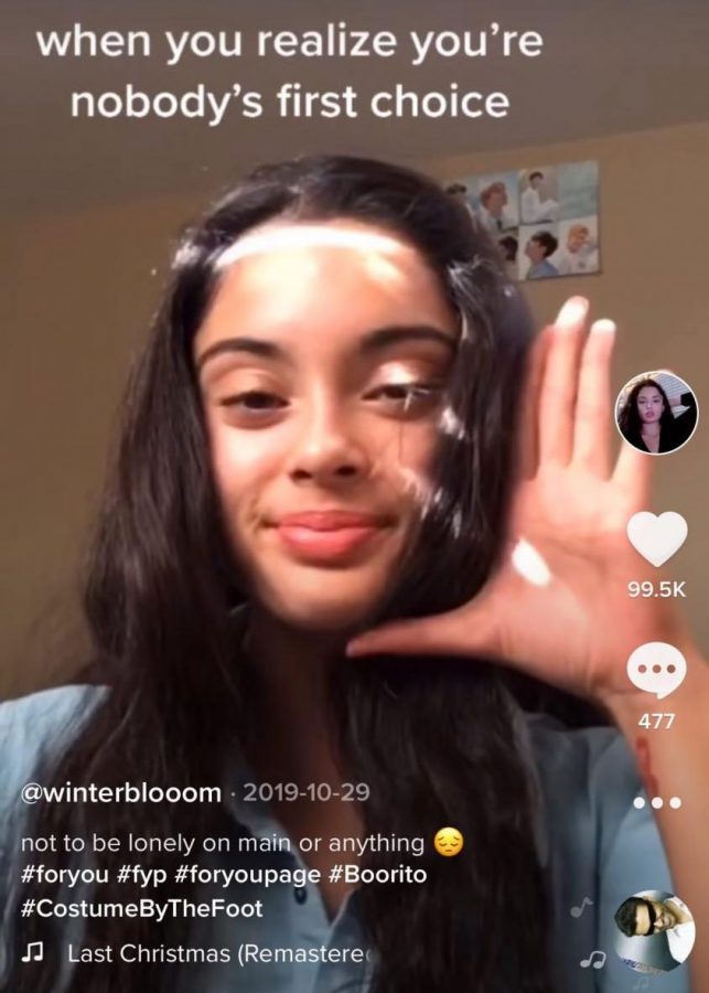 Senior+Winter+Bloom+posts+a+video+on+TikTok+and+adds+text+to+make+her+content+more+relatable.+Photo+by+Winter+Bloom+%7C+Used+with+Permission