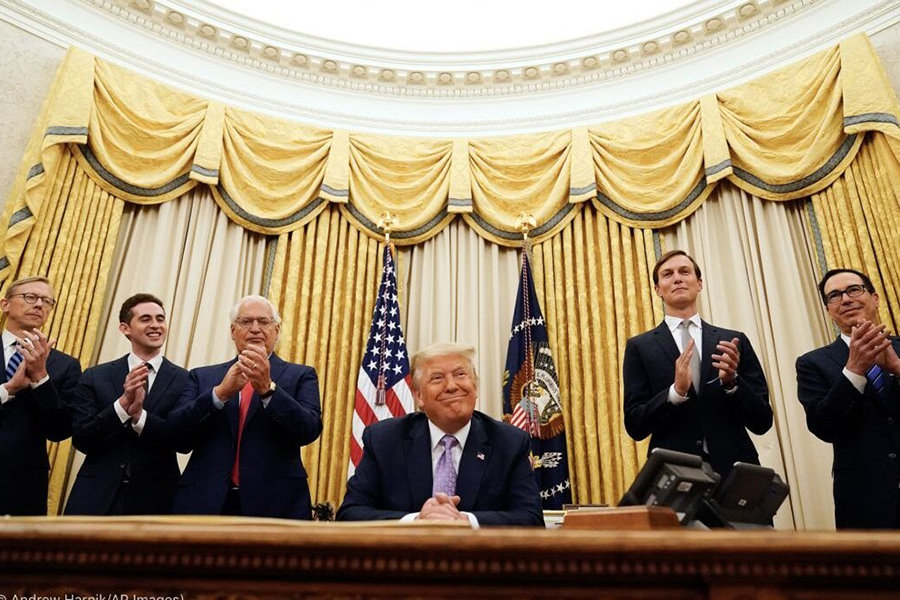 SMILES: President Trump (center) was applauded at the White House Aug. 13 after announcing agreements to normalize diplomatic relations  between Israel and the United Arab Emirates, with (from left), Special Representative for Iran Brian Hook, Special Representative for International Negotiations Avi Berkowitz, US Ambassador to Israel David Friedman, Senior Adviser Jared Kushner, and Treasury Secretary Steven Mnuchin. 