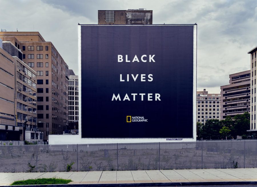 A+Black+Lives+Matter+poster+by+National+Geographic+stands+in+Washington+D.C.