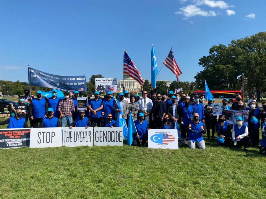 Clad+in+dark+blue+shirts%2C+Uyghur+protestors+gather+in+Washington+D.C.+on+Oct.+1+on+the+Global+Day+of+Action.+The+Chinese+government+has+detained+between+1+million+and+3+million+Uyghurs%2C+a+Muslim+Turkic+minority+native+to+the+Xinjiang+Uyghur+Autonomous+Region%2C+also+known+as+East+Turkestan%2C+in+Northwest+China%2C+in+over+380+internment+camps+since+2017.
