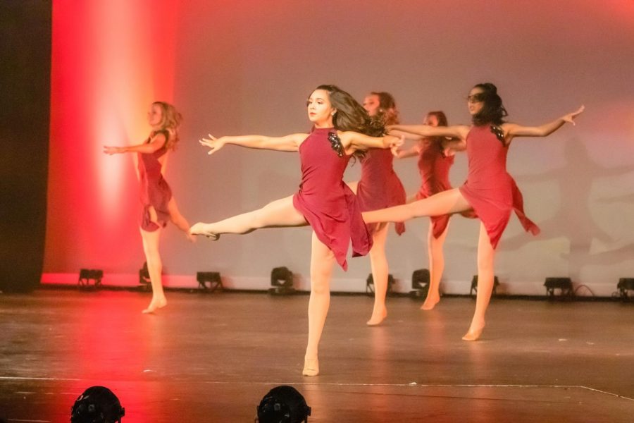 Senior Tristan Finn performs a contemporary piece, her favorite genre of dance, at the Marquettes Spring Show her sophomore year. Joining the Marquettes helped Tristan find a love for dance again after leaving a ballet studio.
