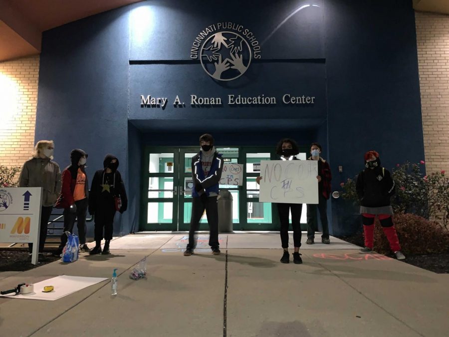 Fighting to remove police from CPS schools, members of Young Activist Coalition protest outside of the Mary A. Ronan Education Center during a school board meeting. They have also spoken with community members and repeatedly informed them of what they can do to continue fighting. 