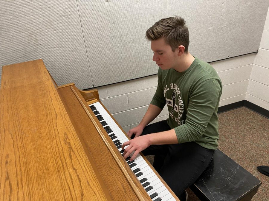 Senior Dominic Zohlen practices the piano. He taught himself to play by ear and also sings along with it. “Several months ago, I decided I wanted to pursue music even further by writing, producing, and uploading my own music for everyone to enjoy,” Zohlen said. “I use a Digital Audio Workstation called Reaper to record and produce my music.”