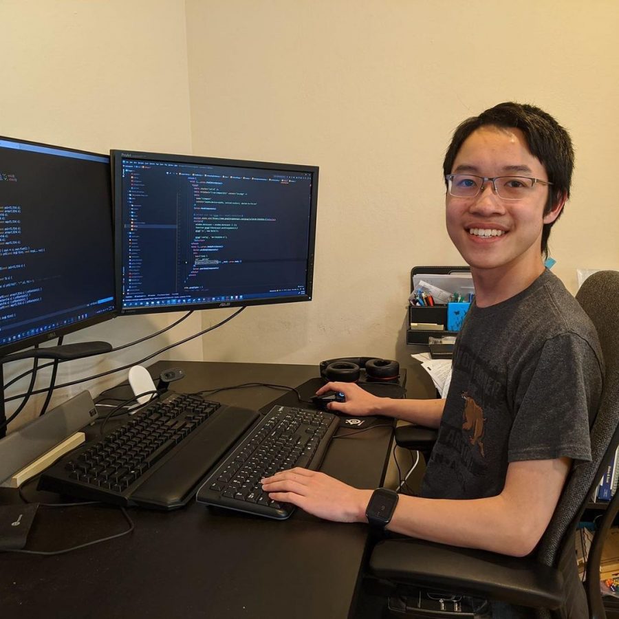 Nathan Wang coding at his desk | Photo by Jimmy Wang