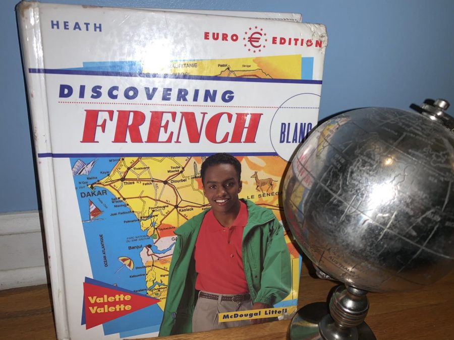 A+French+3+students+textbook+and+globe+are+pictured+in+the+above+photo.