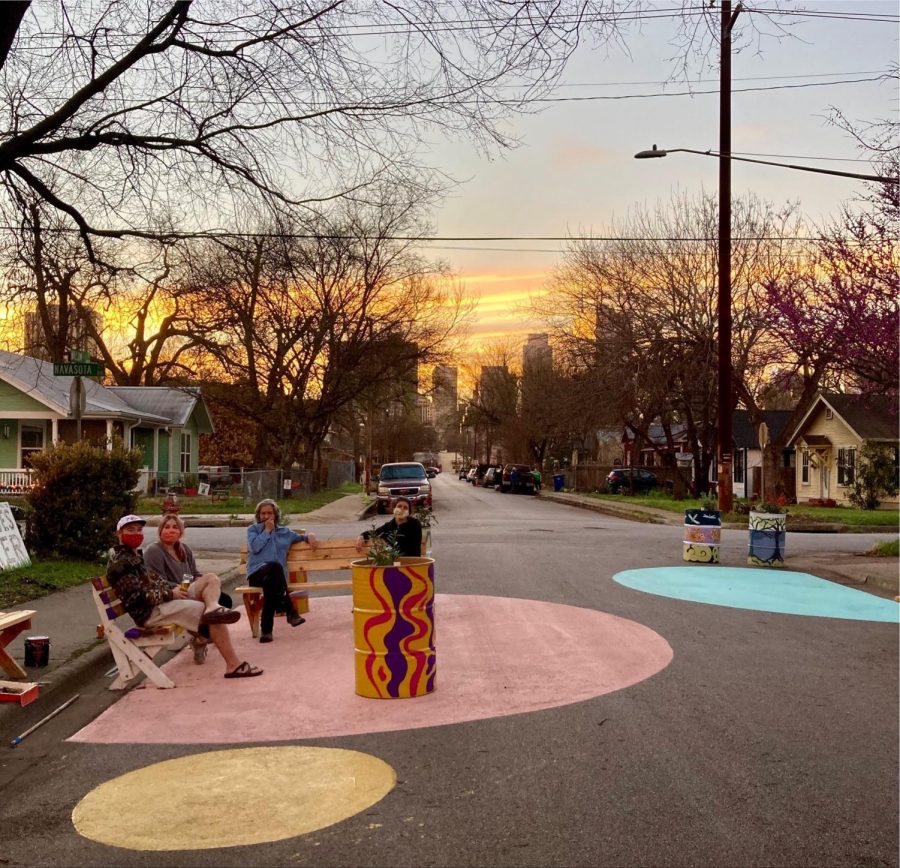 Three+neighbors+sit+on+self-painted+benches+in+the+street%2C+after+a+community+art+event.+This+moment+is+an+example+of+place-making+to+create+a+more+comforting+outdoor+environment.+