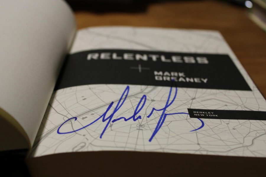 Mark Greaney’s signature on the front page of Relentless, his newest novel which was released on February 16. Special thanks to the staff at Novel for their assistance for this article. 
