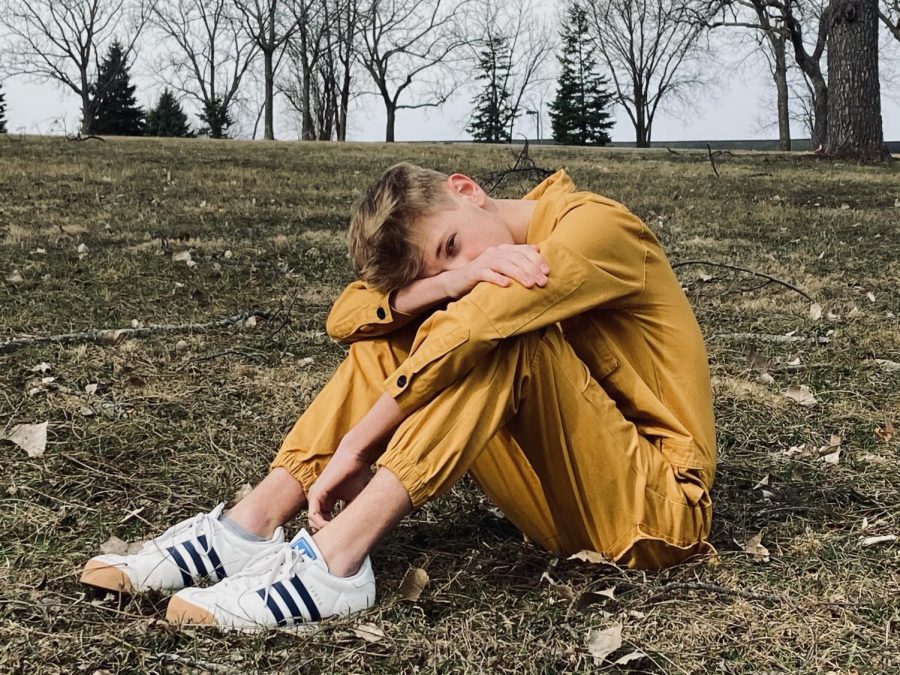 Junior+Connor+Thelen+poses+for+a+photo+in+a+yellow+jumpsuit.+Wearing+bold+outfits+to+school+has+become+a+form+of+expression+for+Thelen+in+the+last+year.+%E2%80%9CAnyone+can+do+it%2C%E2%80%9D+Thelen+said.+%E2%80%9CMore+people+are+gonna+support+you+than+are+gonna+hate+you.+It%E2%80%99s+just+that+the+haters+speak+louder.%E2%80%9D