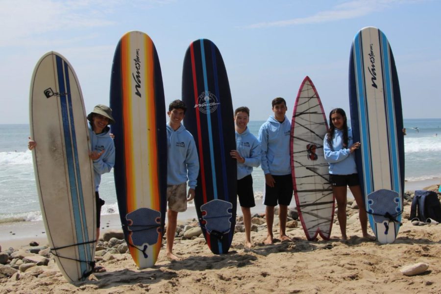 BOARDS:  Members of the Shalhevet Surf Club, along with Judaic Studies teacher Dr. Shiela Keiter, met several times during the summer and plan to continue in the 2021-22 school year.
They are, from left, Dr. Keiter,  Adam Hertzberg, Akiva Rubin, Lippe Popack and Gabriella Bentolila.