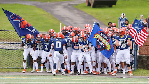 The Utica College Pioneers take the field in their fourth annual New York State Tool Believe Bowl.