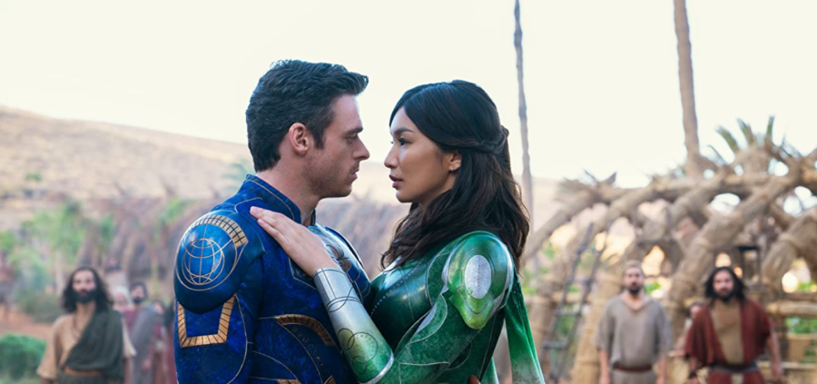 Sersi+%28Gemma+Chan%29+and+Ikaris+%28Richard+Madden%29+share+an+embrace+in+Marvels+Eternals.+The+film+is+now+in+theaters+everywhere.