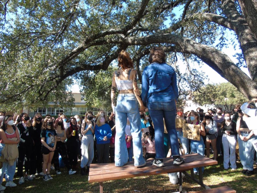 At+2+p.m.+on+Monday+Nov.+15%2C+hundreds+of+students+walked+out+of+their+third-period+classes+in+a+show+of+support+for+students+who+have+been+victims+of+sexual+abuse+or+sexual+assault.+The+group+met+in+the+band+parking+lot+and+then+marched+around+the+perimeter+of+the+school+stopping+often+to+hear+personal+stories+of+assault+and+survival.+Each+story+elicited+embraces+and+statements+of+support+from+members+of+the+crowd.+The+walkout+was+about+building+community+and+improving+systemic+support+on+campus.+%E2%80%9CWe+shared+ideas+for+a+better+support+system+at+Mac+while+talking+about+the+realities+of+the+situation%2C+said+Aubrey+Mitchell%2C+one+of+the+organizers+of+today%E2%80%99s+walkout%2C+%E2%80%9CPeople+cried%2C+laughed%2C+yelled%2C+hugged+and+left+feeling+supported+and+empowered.%E2%80%9D+Caption+by+Dave+Winter.+