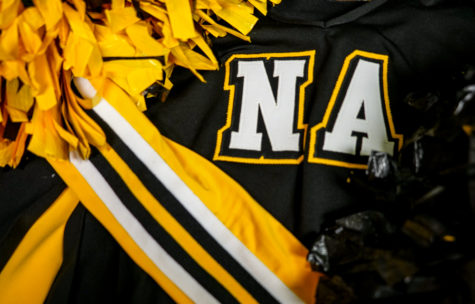 Some schools have divided cheerleading into two squads -- competitive and non-competitive -- in order to satisfy both sides of the debate over cheerleadings status as a sport.
