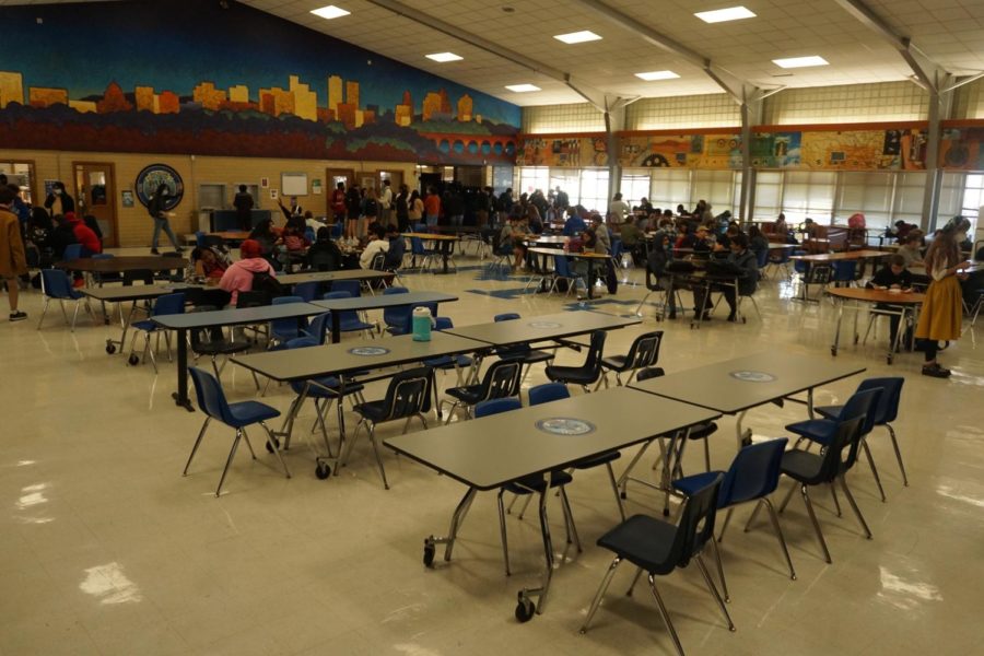 Cafeteria tables sit empty at lunch after Austin Public Health declared that Austin-Travis County had returned to a Stage 5 risk factor.