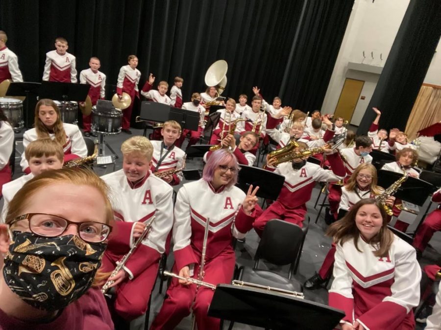Woodwind advisor , Beth Carpenter takes a selfie with six , seventh and eighth grade band!