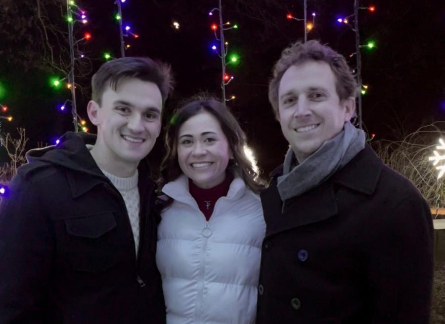 Alumni Grant Aden and Emily Dickson take a photo with their former Latin teacher Tom Herpel to commemorate their engagement. The two have dated for six years and will be living together in Omaha, Neb. as of summer 2022. “What Im most excited about getting married is coming back to St. Louis at some point. I think as much as I [pretend] I dont like St. Louis, we definitely want to come back to raise our family,” Dickson said. “Im looking forward to that, and Grant wants to be a pediatrician. Hes just so good with kids. Im excited about that chapter of our lives.”