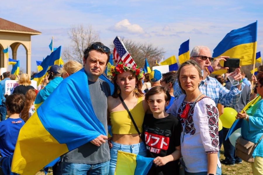 Class of 2021 graduate Sophie Yereshchenko stands with her family at a rally in St. Charles on March 5, 2022 in support of their family and friends in Ukraine. 