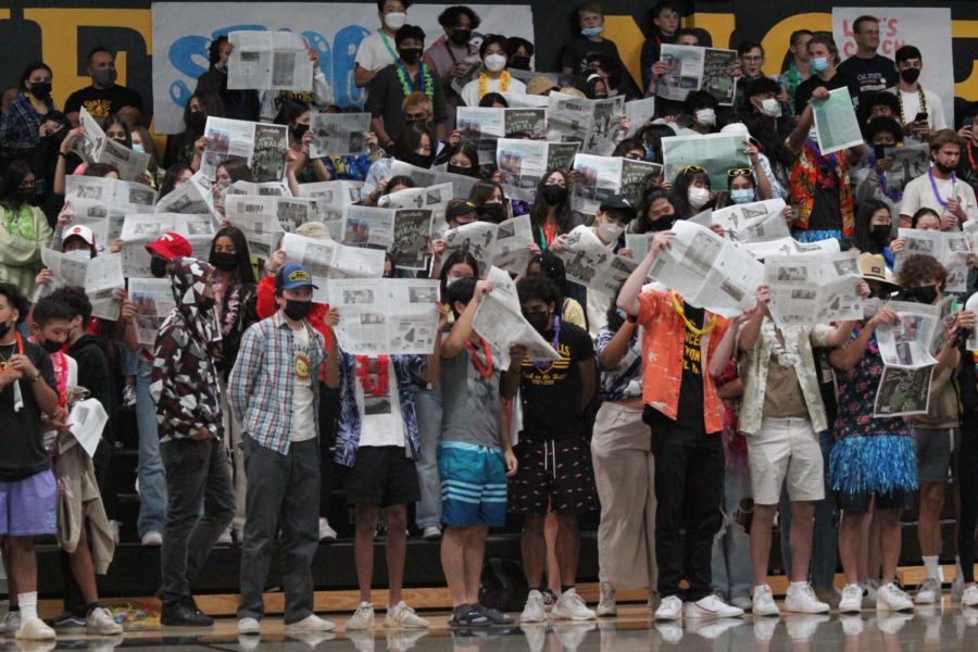 Are they really reading newspapers? Return of fans to basketball games leads to revival of student section antics