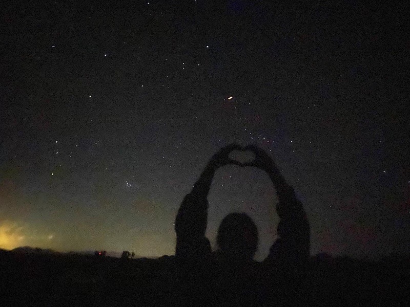 The cover photo for collaborative single, “Will You Be My Light Switch,” by seniors Jaden Path and Puneet Singh features a dark silhouette of Singh creating a heart with her hands under a starry night sky at Joshua Tree National Park. “I was showing him some of my other pictures, and he really liked that one,” Singh said. “And honestly, I really liked it too, because I feel like the vibes of the picture were correct for the song.”