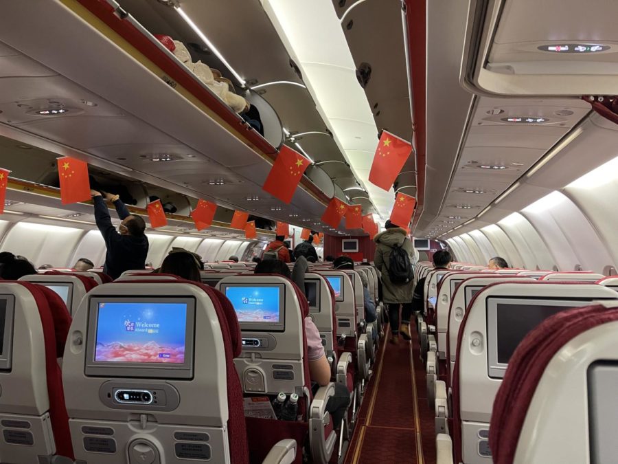 Hainan+Airlines+carried+out+the+first+evacuation+flights+organized+by+the+Chinese+government.+The+Chinese+flag+was+pasted+in+the+cabin%2C+Wang+said.+Im+very+excited+because+it+means+Im+in+the+safe+zone.