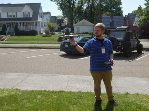 A HIGH-FLYING ADVENTURE. Sevier technology specialist Zach Welch holds one of his drones. Welch has a thriving side-business using drones for aerial photography.