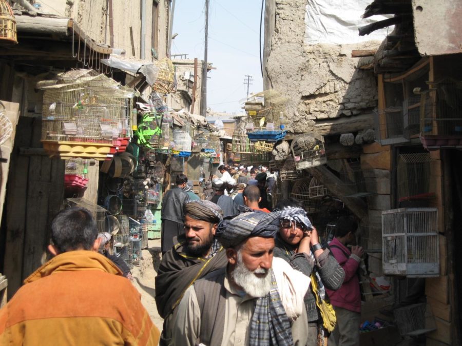 Michael Shaikh captures a photo of Afghans walk the streets of Kabul.