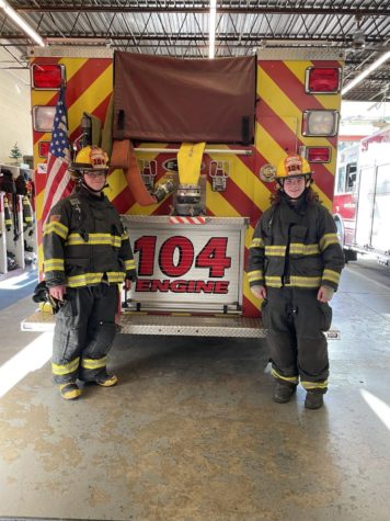 Sophomore Ryan Bischoff (left) and sophomore Brayden Klingensmith are junior firefighters at Station 104.