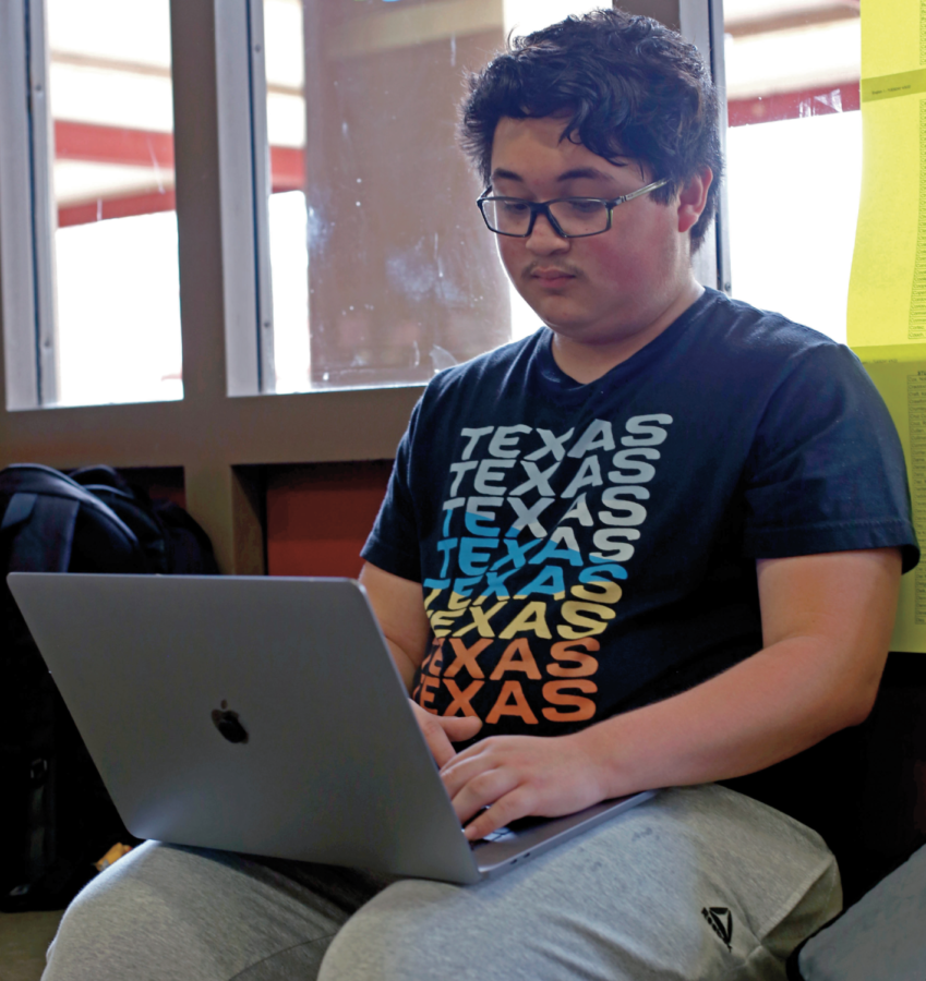 MAKING BANK: Sophomore Nick Vega checks on the status of his cryptocurrency, a form of online currency that has been increasing in popularity. A few months ago, Vega bought a fork of the Solana cryptocurrency blockchain and has been using an investing in it since.