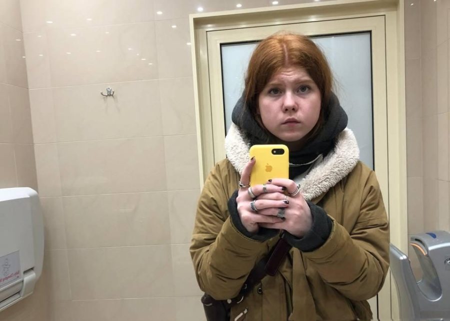 TRAVELING%3A+Polina+Vorona%2C+18%2C+stopped+to+take+a+selfie+in+a+restroom+on+her+way+from+Ukraine+to+Poland+in+February.+She+and+her+grandmother+traveled+together+from+Kyiv%2C+leaving+behind+Polinas+father+and+grandfather.+I+know+it%E2%80%99s+really+hard+for+Granny%2C+Polina+said%2C+%E2%80%9C%5Bto%5D+be+separate+%5Bfrom%5D+her+husband%2C+with+my+grandfather%2C+for+the+first+time+in+I+don%E2%80%99t+know%2C+40+years.