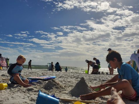 Families enjoy the beaches in Fort Myers prior to Hurricane Ian. The hurricane caused damage throughout Southwest Florida, including areas like Fort Myers.