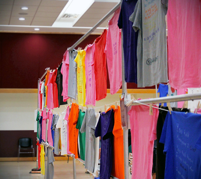 The+Clothesline+Project+was+an+interactive+exhibit+held+on+Oct.+27%2C+2022%2C+in+the+Corbett+Center+Student+Union+West+Ballroom.+Participants+anonymously+hung+up+different+colored+shirts+with+their+stories+to+raise+awareness+for+assault+and+abuse+survivors.