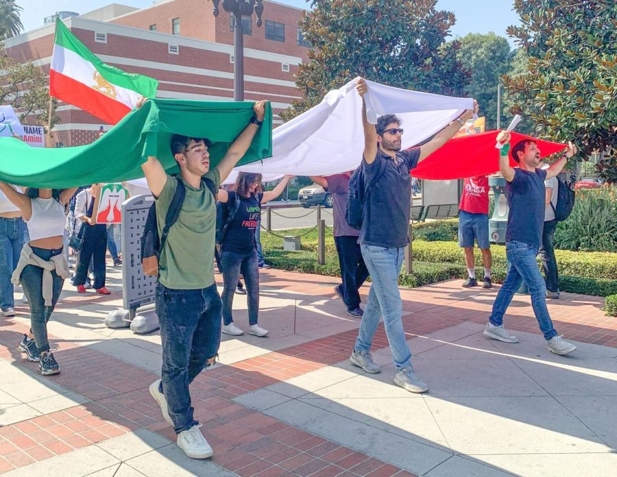 Students from the University of Southern California march around USCs campus to protest Mahsa Aminis death and the lack of womens rights in Iran. 