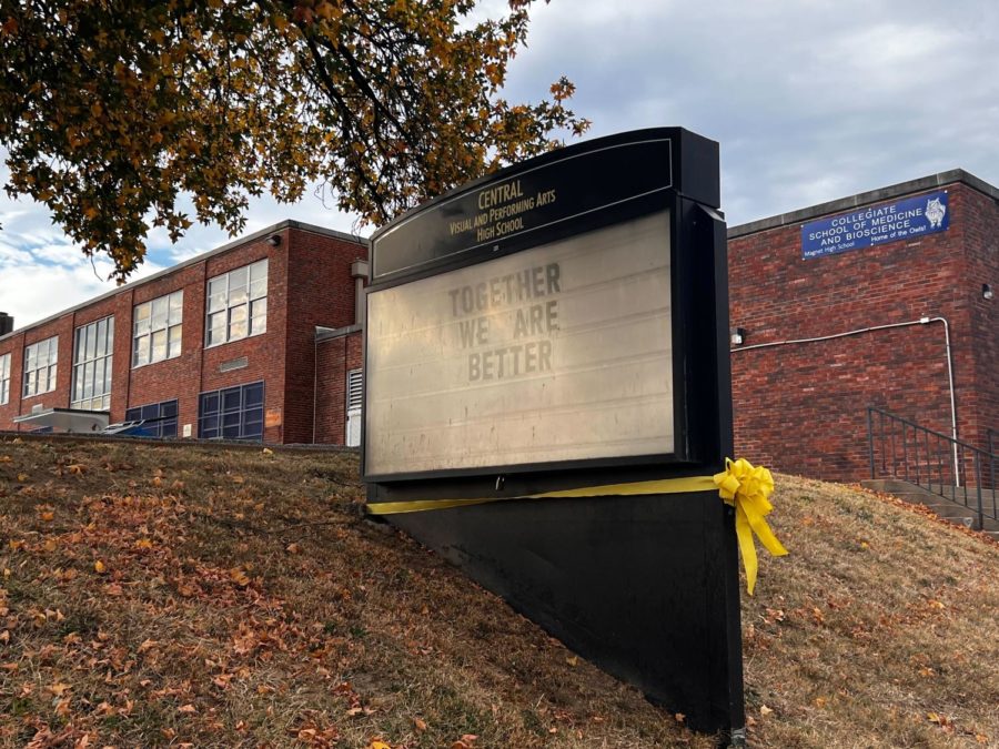 After a school shooting at Central Visual and Performing Arts High School, the message board is adorned in a yellow ribbon. 