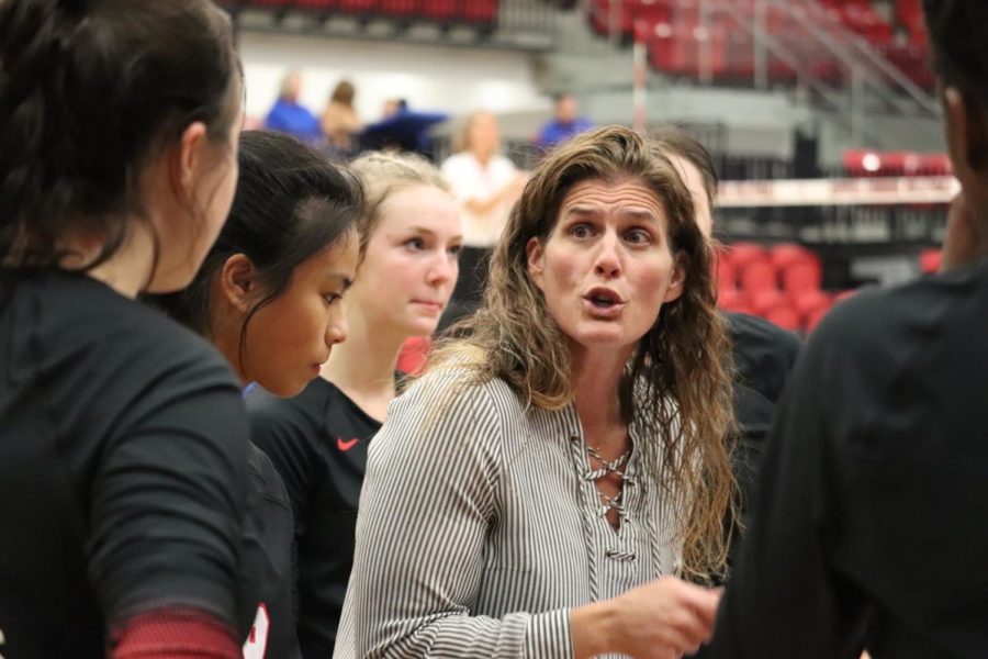 Coppell volleyball coach Robyn Ross leads a team huddle at CHS Arena against Plano West on Oct. 14. Ross was named Cowgirls volleyball coach this year after coaching for Nansemond-Suffolk Academy in Virginia for 13 years. 