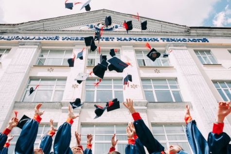 Students like these who are graduating high school are deeply affected by Affirmative Action. Photo by Vasily Koloda on Unsplash.