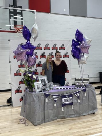 MAKING IT OFFICIAL: Katie Hansen poses with coach Madeline Evans during signing day. Hansen will continue her volleyball career at Stephen F. Austin next fall.