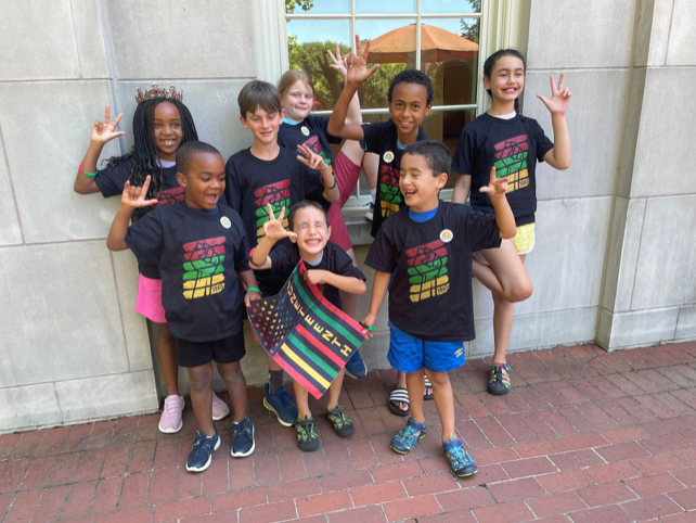 Eight+of+the+younger+Commons+kids+celebrate+Juneteenth+together.+%28Photo+courtesy+of+Dr.++Roosevelt+Noble%29