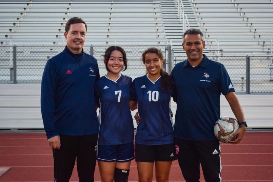 Seniors+and+varsity+soccer+players+Livia+Inojoza+and+Samantha+Strand+have+been+coached+by+their+fathers+for+their+whole+lives.