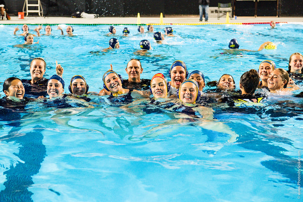 The girls celebrated their twentieth league win by jumping back in the pool with their coaches after the game