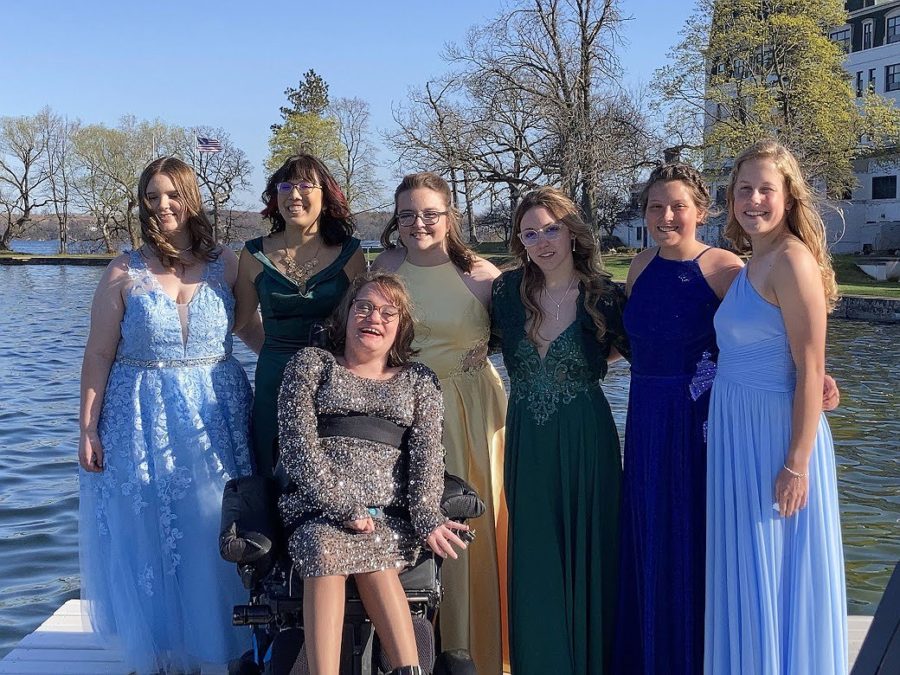 Ella was diagnosed with cerebral palsy when she was just a baby. The Weiske family has started a donation program to help Ella receive robotic legs so that she will be able to walk on her own. Ella shares memories with a group of friends at prom 22. 