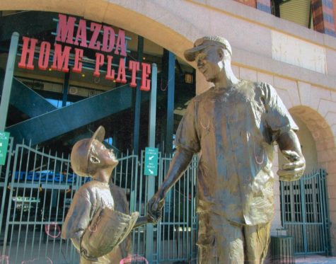 10 FEET TALL. A statue of senior Cooper Stone and his father Shannon Stone was dedicated in 2012 by the Texas Rangers baseball team after Shannon lost his life in an accident in 2011 at the ballpark.