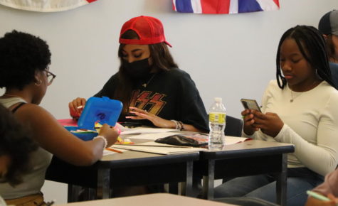 Senior Jasmyne Johnston, freshman Zenthani Wilson and frehsman Suriyah Ali work on an assignment during sixth period African American Studies class. The honors class was offered for the first time in 2022-23, and an AP level class was scheduled to be offered in all Seminole County high schools next year, but the state denied the course.