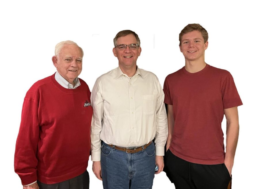 Bill Bywater '57, David Bywater '85, and Adam Bywater '23 pose for a family portrait