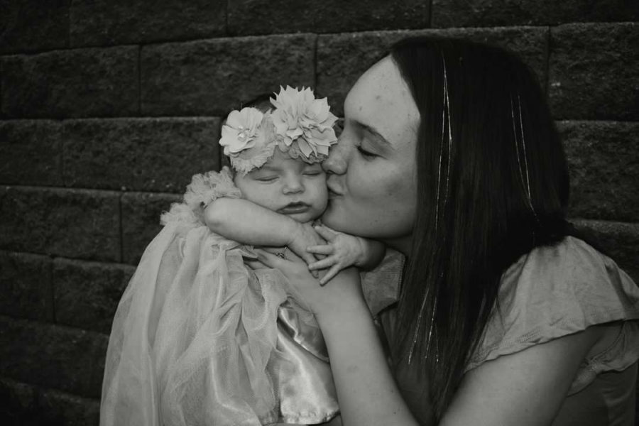 Williams poses with her baby in a mother-daughter photoshoot. Her daughter, Blakelyn Shay, was born May 10, 2022.