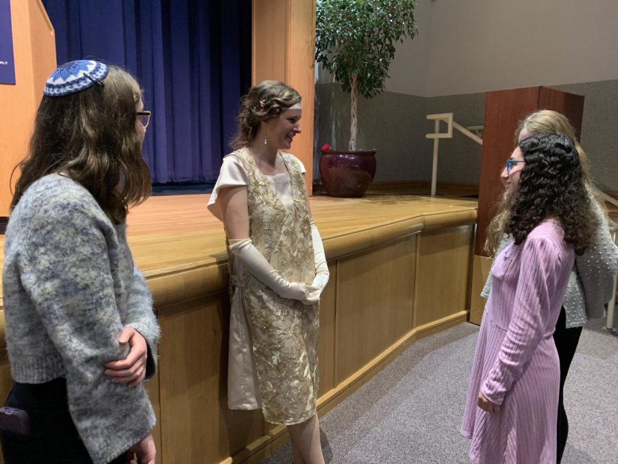 Armstrong answers students' follow-up questions after her presentation. "It was even more impressive to meet her in person than have her stand on the stage," junior Gabi Simon (left) said.