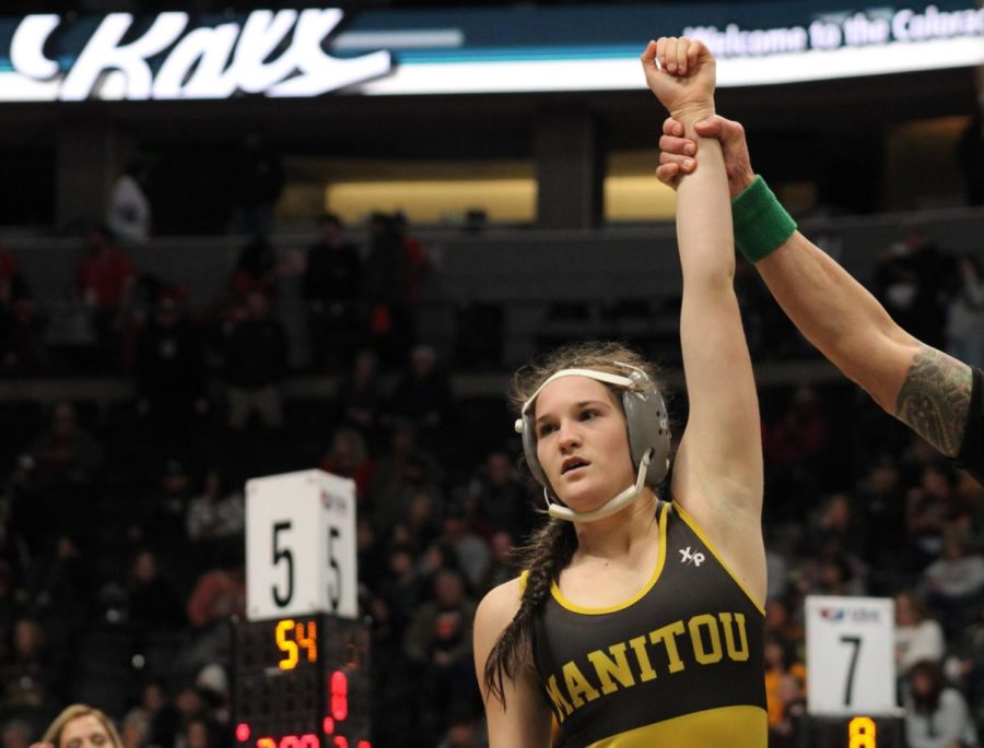 Abbigail Reeves (10) hand is raised as she wins a match at the State Tournament.