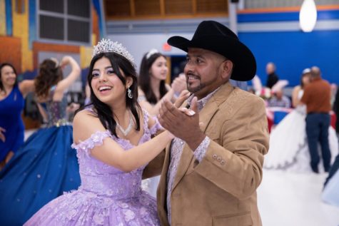 LOVE AND JOY: As she dances in her beautiful dress, sophomore Amy Love reflects on the joy it brings to see her father so happy during the McCallum Quinceañera. I think that this event was really beautiful and fun to experience especially for my dad, seeing him so happy and having my family experience this, Love said. My family isn’t big on doing huge celebrations so me and my sister weren’t able to have a quinceañera, but we loved being able to share this day with all the other quinceañeras and their families. Despite the stress of daily meetings and practices leading up to the event, Love found it all worth it for the fun and memories made on the quinceañera day. It was really stressful doing the whole entire meetings and practice because it was every single day, but whenever it was the actual day of it, it was actually really fun, Love said. Overall, Love found the quinceañera event to be a very meaningful experience, which could not have happened without the hard work of Spanish teacher Juana Gun. I want to give a huge thank you to Ms. Gun for making it all possible and being such a sweet person to all of us, Love said. Caption by Gergő Major.