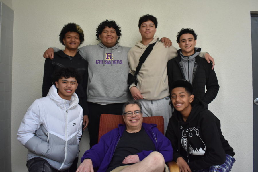 Zachary Jones ’23, Angelo Orellana ’23, Jacob Kleppin ’23, Valente Espino
’23, AJ Buban ’23, and Ricky Corvera ’23 gather around Mike McGarry, commemorating his career. 