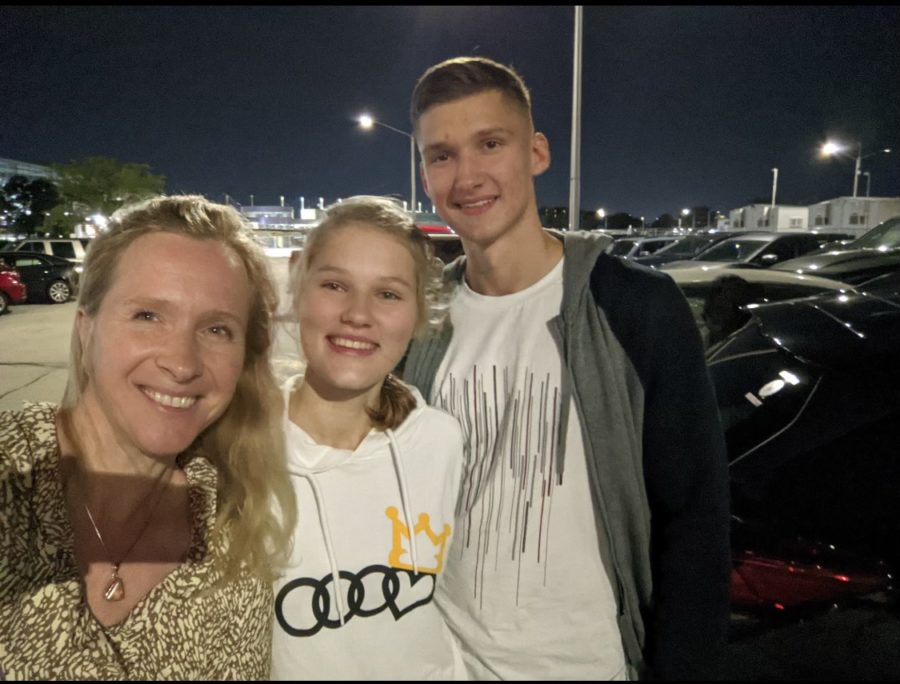 After Ukraine was attacked by Russian forces, Mary, middle, traveled across Europe to escape to Lake Forest. She is pictured here with her friend Michael.