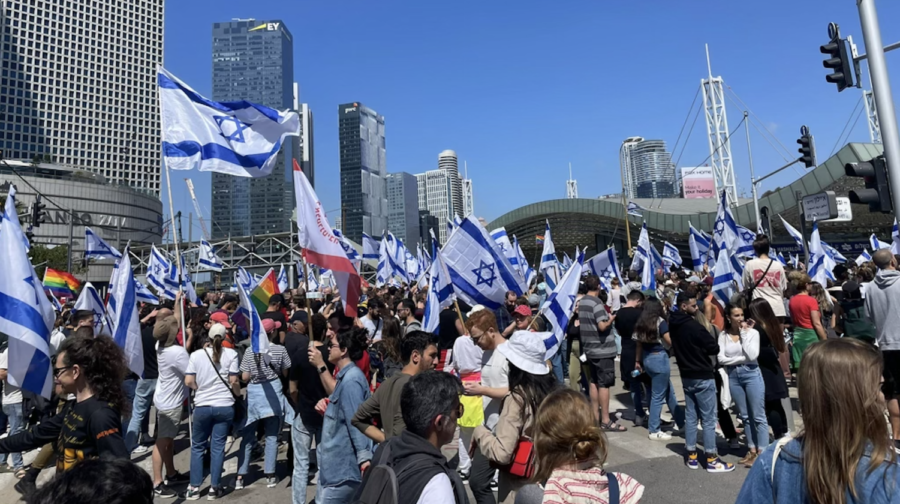 PROTEST%3A+Israelis+filled+the+streets+on+March+27%2C+the+day+of+the+civil+strike%2C+outside+of+the+HaShalom+Train+Station+in+Tel+Aviv.+The+demonstrations+stopped+after+Prime+Minister+Netanyahu+halted+the+process+of+implementing+the+proposed+judicial+reforms.